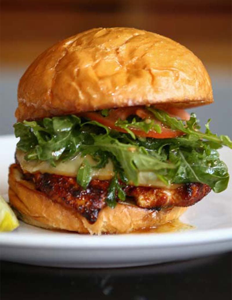 A grilled chicken sandwich featured in Southpointe PA Magazine, served on a toasted bun.